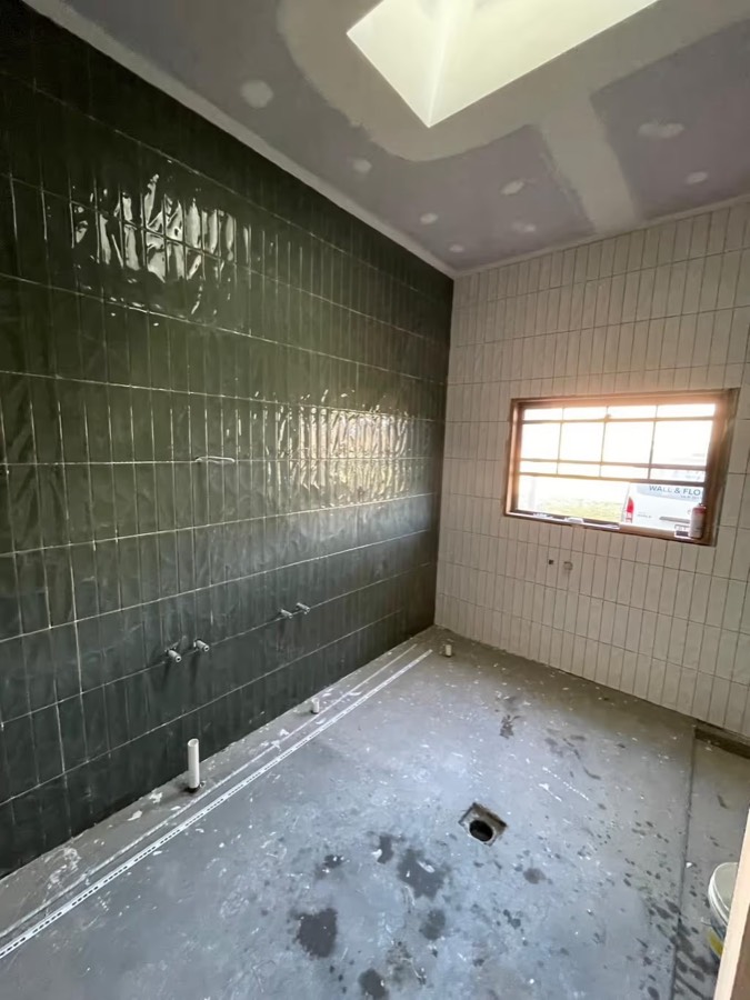 Shower wall & linear drain — recent work